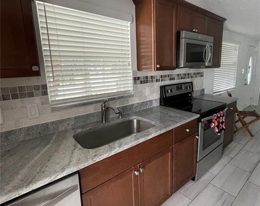 6405 White Sands Terrace - Photo Thumbnail 7