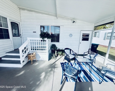 2399 Coconut Palm Drive Ne - Photo Thumbnail 1