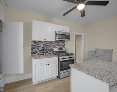 5723 Spruce St - Photo Thumbnail 4