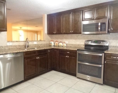 9105 Tudor Drive - Photo Thumbnail 5