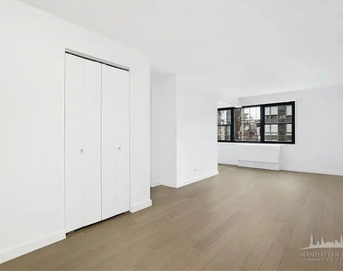 E 39th St - Photo Thumbnail 3