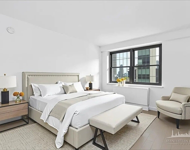 E 39th St - Photo Thumbnail 2
