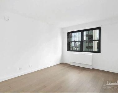 E 39th St - Photo Thumbnail 4