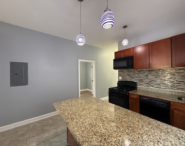 9738 S Avenue L - Photo Thumbnail 1