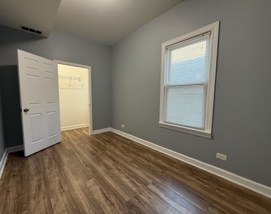 9738 S Avenue L - Photo Thumbnail 3