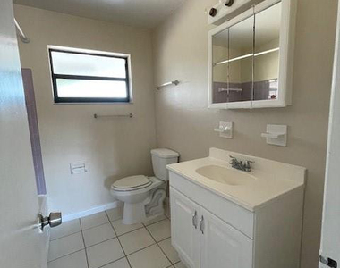 1711 S Cypress Road - Photo Thumbnail 5