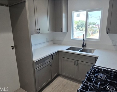 833 E 92nd - Photo Thumbnail 2