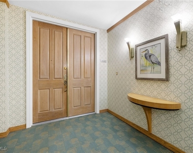 7515 Pelican Bay Boulevard - Photo Thumbnail 1