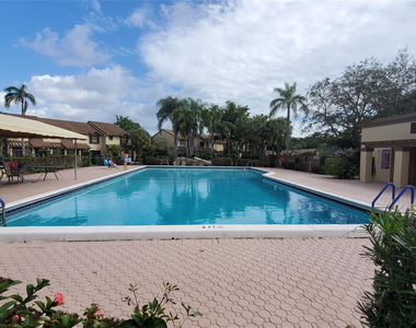 3831 Cocoplum Circle - Photo Thumbnail 2