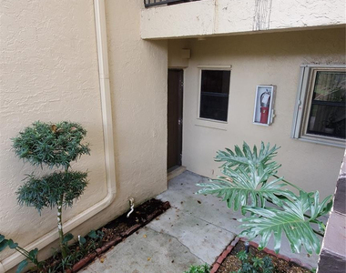 3831 Cocoplum Circle - Photo Thumbnail 3