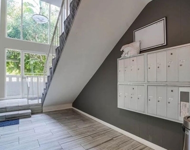 1233 N Flores Street - Photo Thumbnail 8