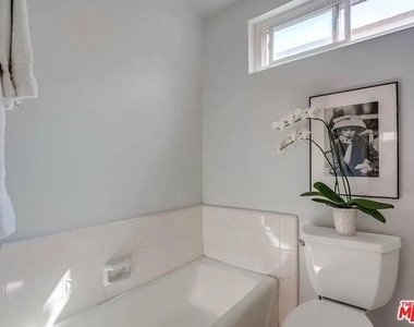 1233 N Flores Street - Photo Thumbnail 6