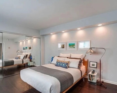 1233 N Flores Street - Photo Thumbnail 3