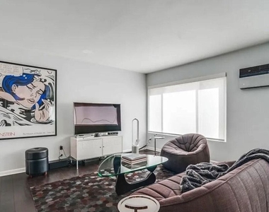 1233 N Flores Street - Photo Thumbnail 1