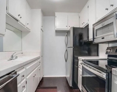 1233 N Flores Street - Photo Thumbnail 7