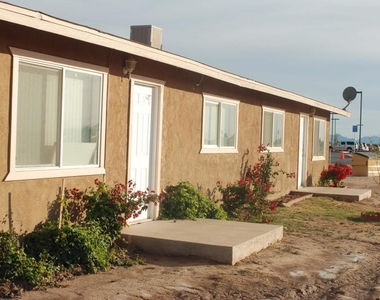 10340 E Vernon Avenue - Photo Thumbnail 2