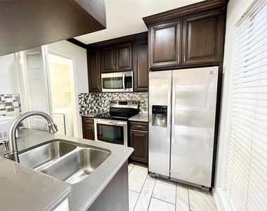 1450 Meadowood Village Drive - Photo Thumbnail 2