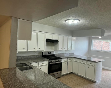 9507 Braeburn Glen Boulevard - Photo Thumbnail 1