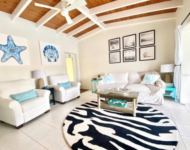 6006 Midnight Pass Road - Photo Thumbnail 4