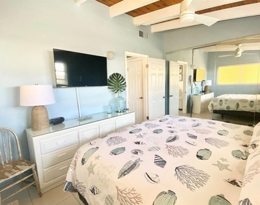 6006 Midnight Pass Road - Photo Thumbnail 8