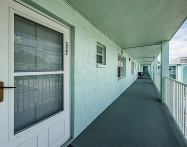 1706 Belleair Forest Drive - Photo Thumbnail 1
