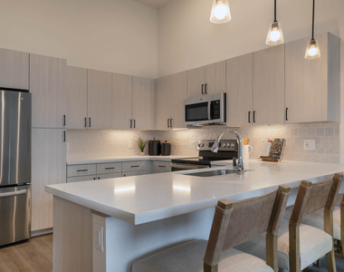 9345 E 56th Ave - Photo Thumbnail 2