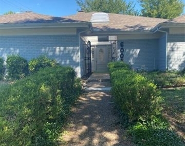 6005 Black Berry Drive - Photo Thumbnail 1