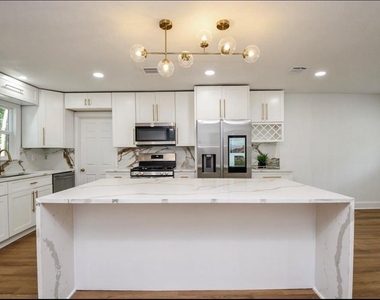 6834 Saint Augustine Street - Photo Thumbnail 2