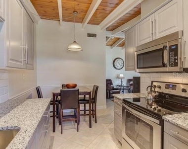 6006 Midnight Pass Road - Photo Thumbnail 4