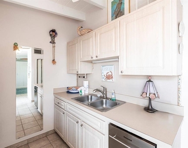6006 Midnight Pass Road - Photo Thumbnail 5