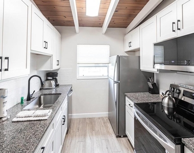 6006 Midnight Pass Road - Photo Thumbnail 7