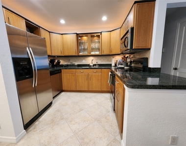 6437 Bay Club Drive - Photo Thumbnail 2