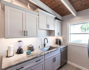 6006 Midnight Pass Road - Photo Thumbnail 8