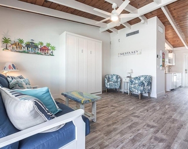 6006 Midnight Pass Road - Photo Thumbnail 1