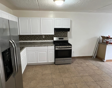 56-11 Clover Place - Photo Thumbnail 2