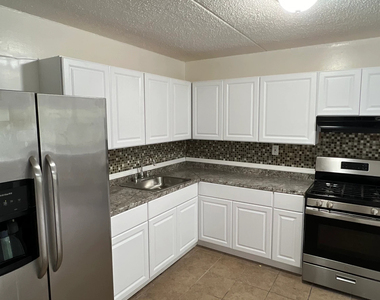 56-11 Clover Place - Photo Thumbnail 1