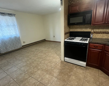 56-11 Clover Place - Photo Thumbnail 2