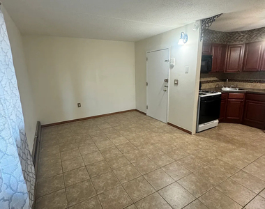 56-11 Clover Place - Photo Thumbnail 1