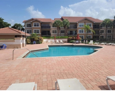 8741 Wiles Road - Photo Thumbnail 12