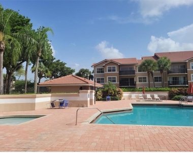 8741 Wiles Road - Photo Thumbnail 13