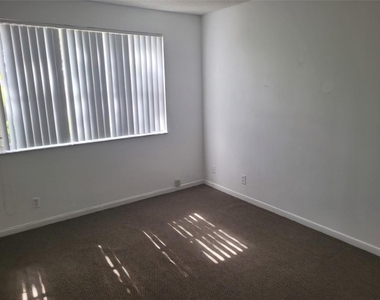 8741 Wiles Road - Photo Thumbnail 6