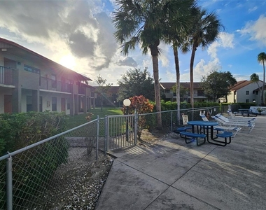 5583 Courtyard Drive - Photo Thumbnail 1