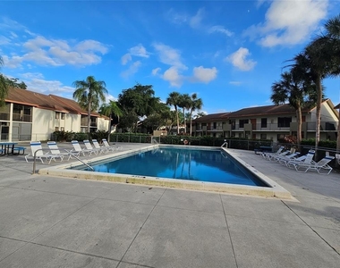5583 Courtyard Drive - Photo Thumbnail 2