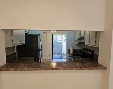 5583 Courtyard Drive - Photo Thumbnail 3