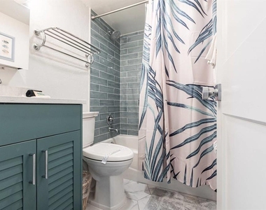 6006 Midnight Pass Road - Photo Thumbnail 7