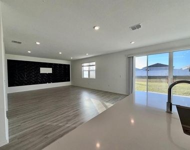 1209 Mattie Pointe Boulevard - Photo Thumbnail 4