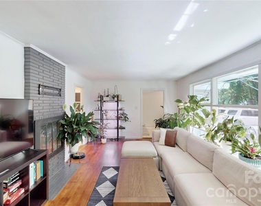 1136 E Woodlawn Road - Photo Thumbnail 6