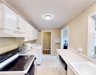 1136 E Woodlawn Road - Photo Thumbnail 10