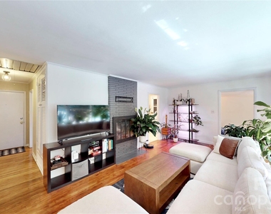 1136 E Woodlawn Road - Photo Thumbnail 3