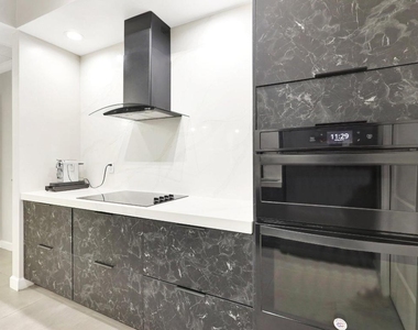 801 S Olive Avenue - Photo Thumbnail 11